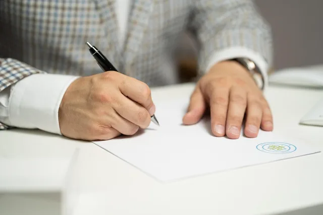 man, sign, paper, write, document, contract, signing, agreement, signature, signing document, signing contract, signing paper, sign, contract, contract, contract, contract, contract, signing, agreement, signature, signature. Welsh Language Standards: Cardiff briefs for niche influencers